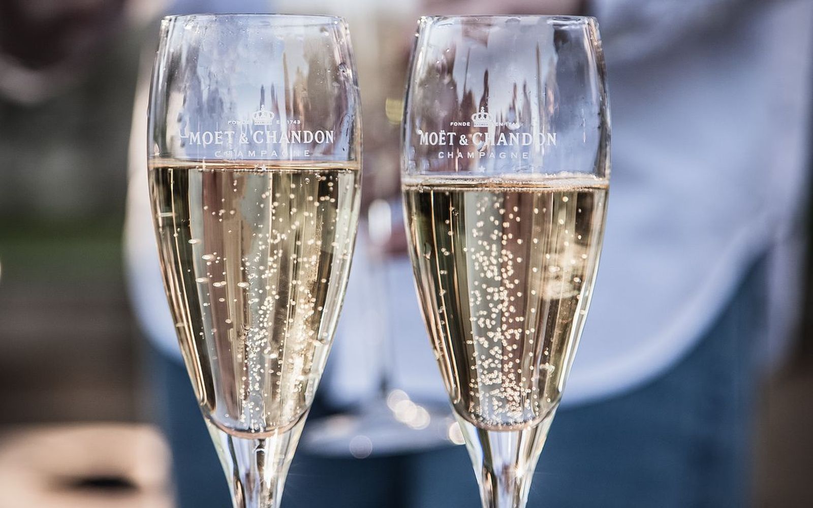 Champagne poured into two flutes