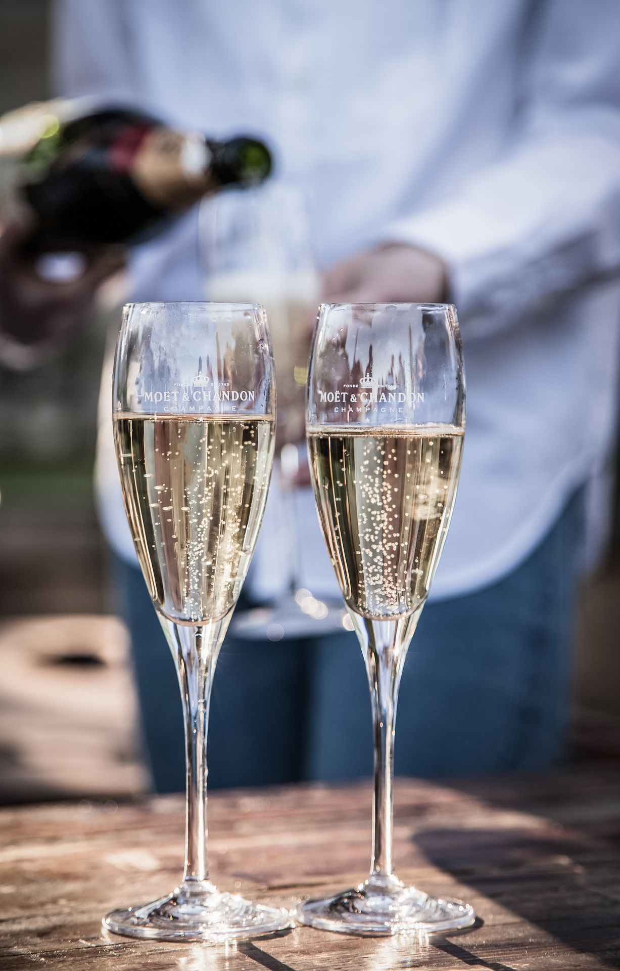 Champagne poured into two flutes